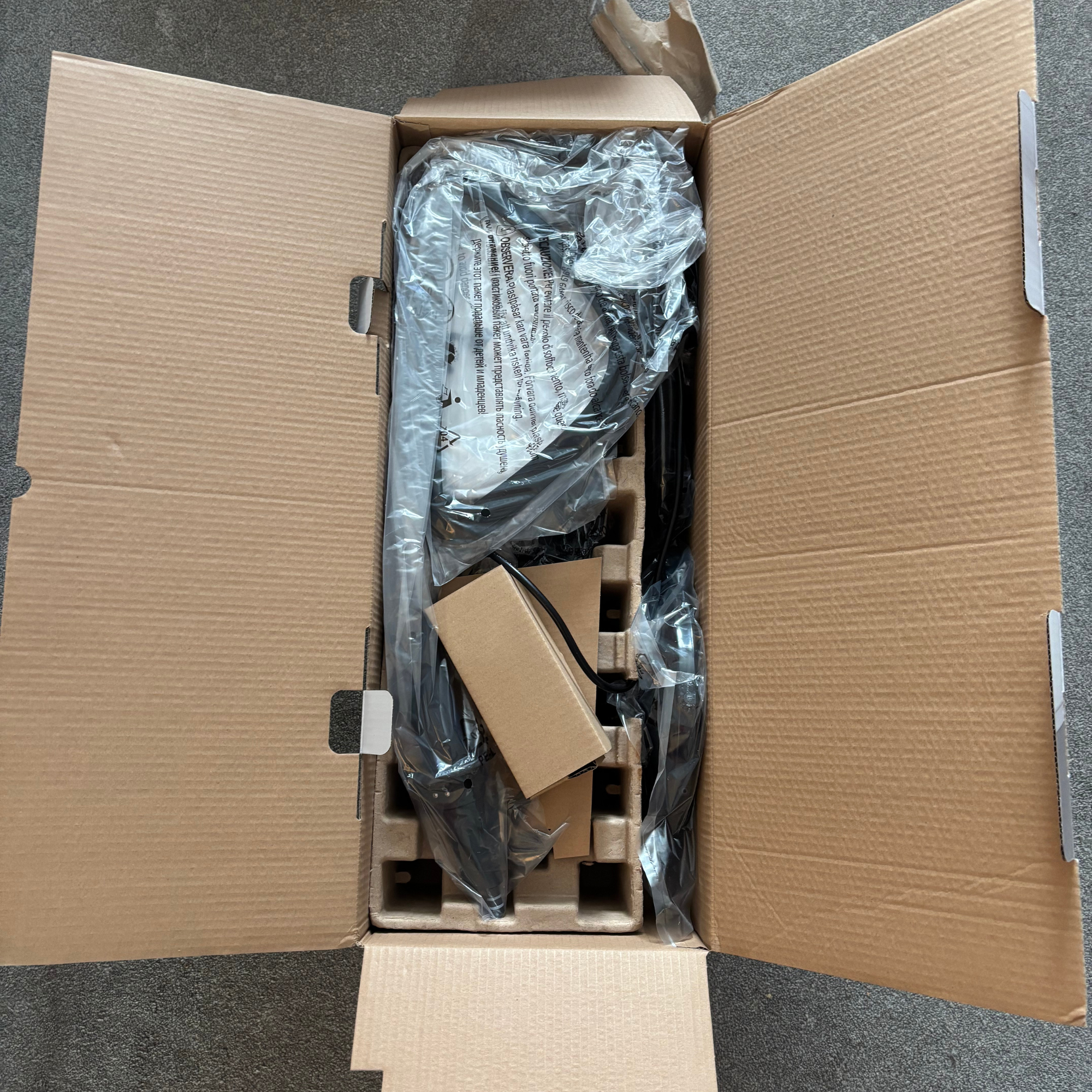 above view of inside of Lakeland 2-in-1 Steam Mop packaging