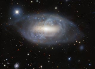 A full view of the Helix Galaxy, also known as the Pancake Galaxy.