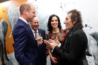 Prince William and Ronnie Wood at a charity function