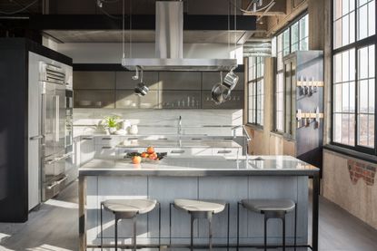 Stainless steel kitchen by Studio Gild