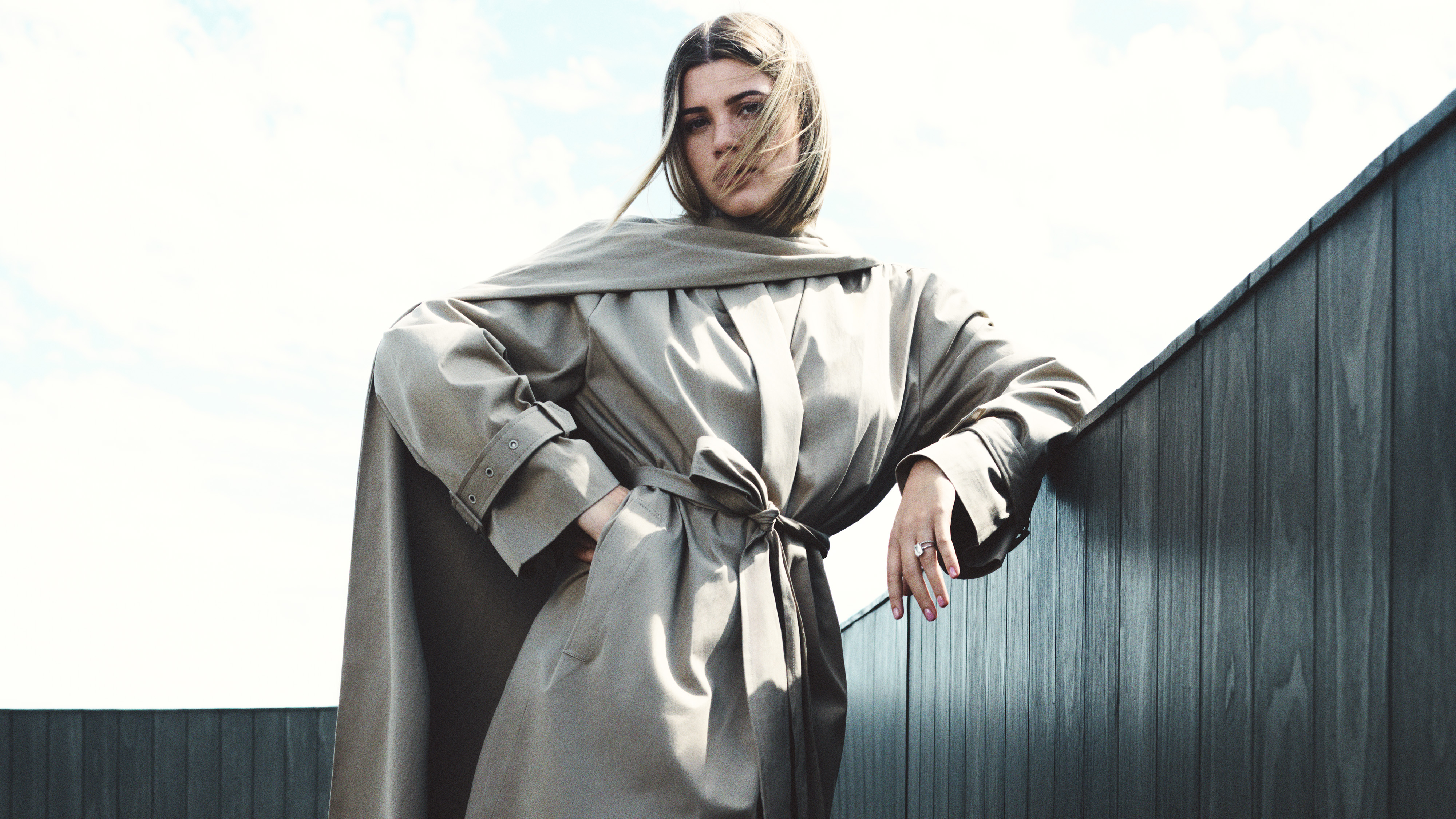 Sofia Richie Grainge wearing a trench coat from her new line, SRG.