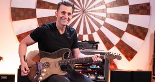 Dweezil Zappa plays a cardboard Fender Stratocaster in Hikari Studios, Los Angeles.