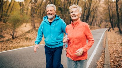 Man and woman walking outside