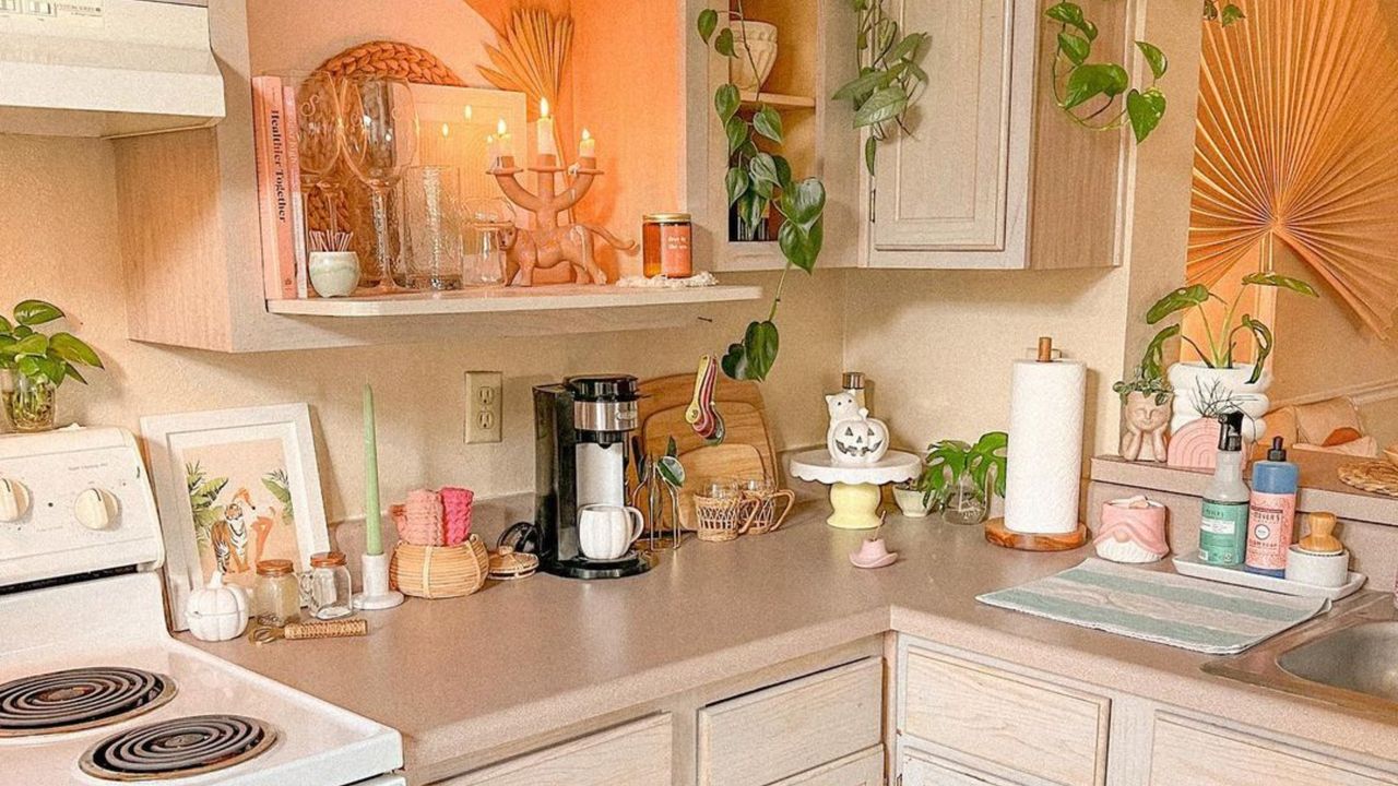 Warm kitchen with neutral counters and boho decor