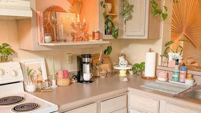 Warm kitchen with neutral counters and boho decor