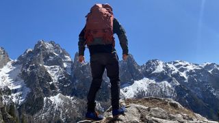 Alex with Osprey Kestrel in Dolomite mountains