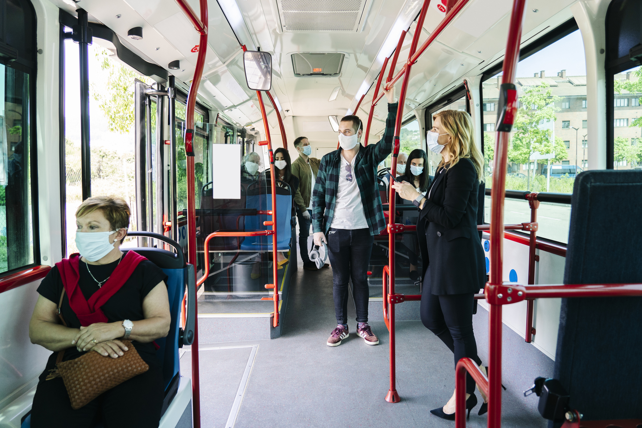People wearing face masks on public transport as the roadmap out of lockdown begins to rollout in England
