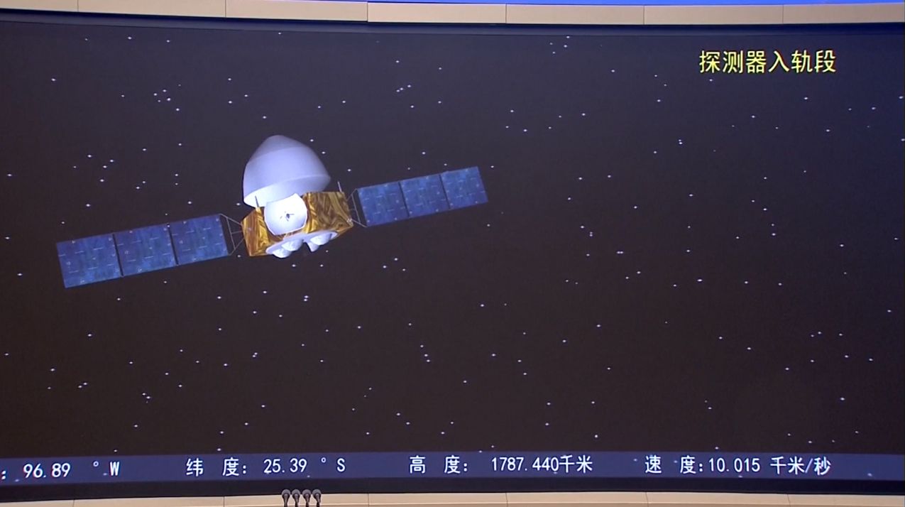 This screenshot from a CCTV broadcast shows a depiction of China's Tianwen-1 Mars orbiter-rover-lander after spacecraft separation and solar array deployment on July 23, 2020.