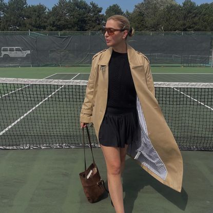 kerry pieri wearing trench coat 