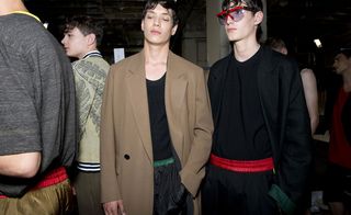Males models wearing black and tan jackets over black tshirts from the Cerruti 1881 SS2015 collection