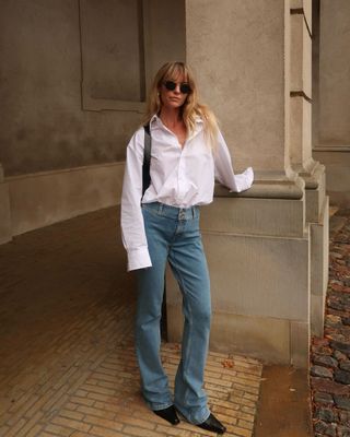 @_jeanettemadsen_ wearing white shirt and jeans