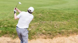 MacGregor V Foil Wide Sole Sand Wedge being played from a bunker