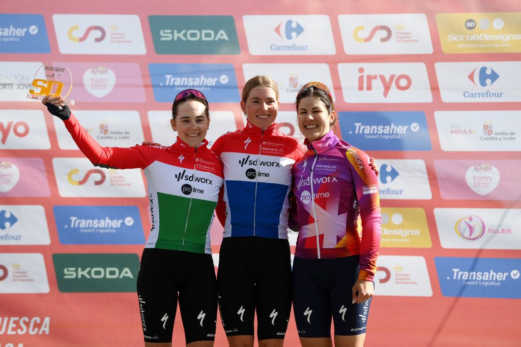 JACA SPAIN MAY 02 LR Blanka Vas of Hungary Demi Vollering of The Netherlands and Elena Cecchini of Italy and Team SD Worx Protime celebrate at podium as best team prize winners during the 10th La Vuelta Femenina 2024 Stage 5 a 1139km stage from Huesca to Alto del Fuerte Rapitan Jaca 1103m UCIWWT on May 02 2024 in Jaca Spain Photo by Alex BroadwayGetty Images