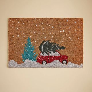 Dunelm christmas doormat with car.