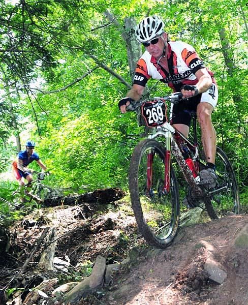 Tom Ettinger rocks the descent on his way to a 55-59 class win.