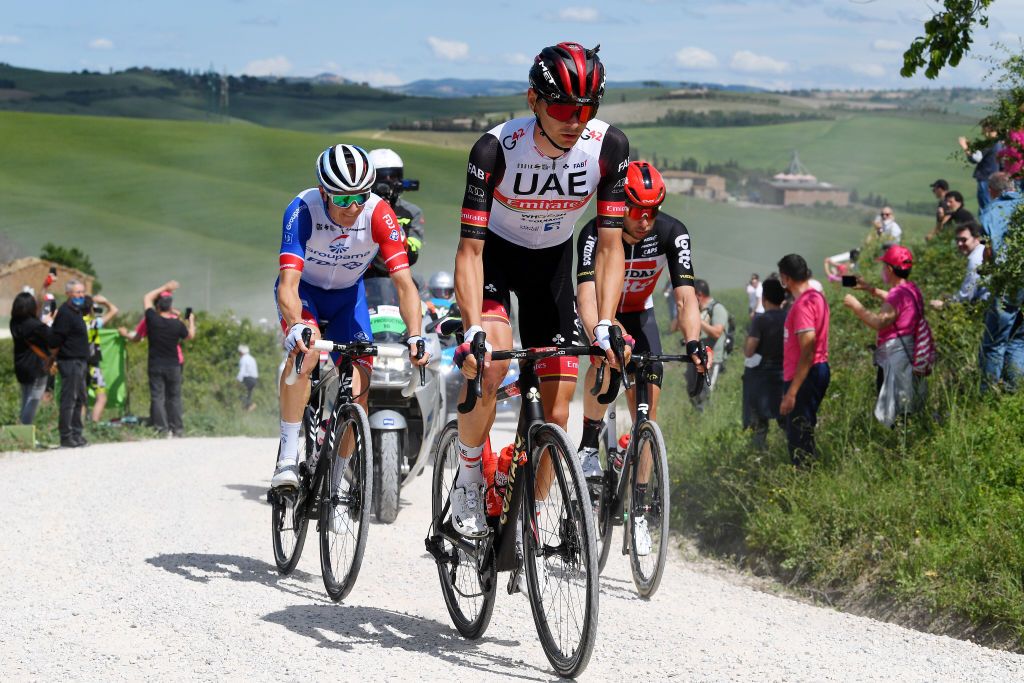 MONTALCINO ITALY MAY 19 Alessandro Covi of Italy and UAE Team Emirates Simon Guglielmi of France and Team Groupama FDJ Roger Kluge of Germany and Team Lotto Soudal in breakaway during the 104th Giro dItalia 2021 Stage 12 a 162km stage from Perugia to Montalcino 554m Public Fans Gravel Strokes girodiitalia UCIworldtour Giro on May 19 2021 in Montalcino Italy Photo by Tim de WaeleGetty Images