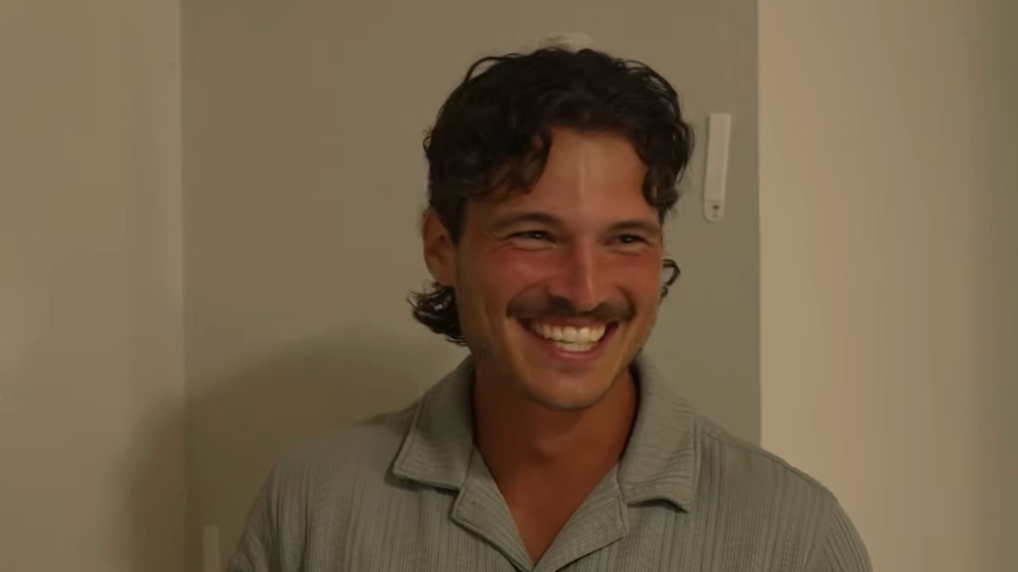 Rome smiles while touring his house before entering Big Brother.