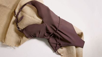 Hawaiki halterneck swimsuit in brown with a tie waist