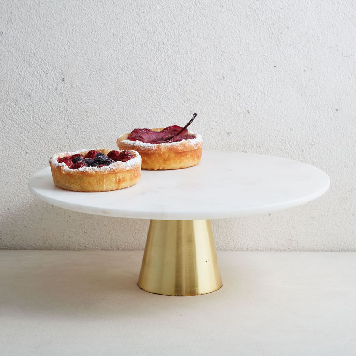 marble and brass cake stand from West Elm