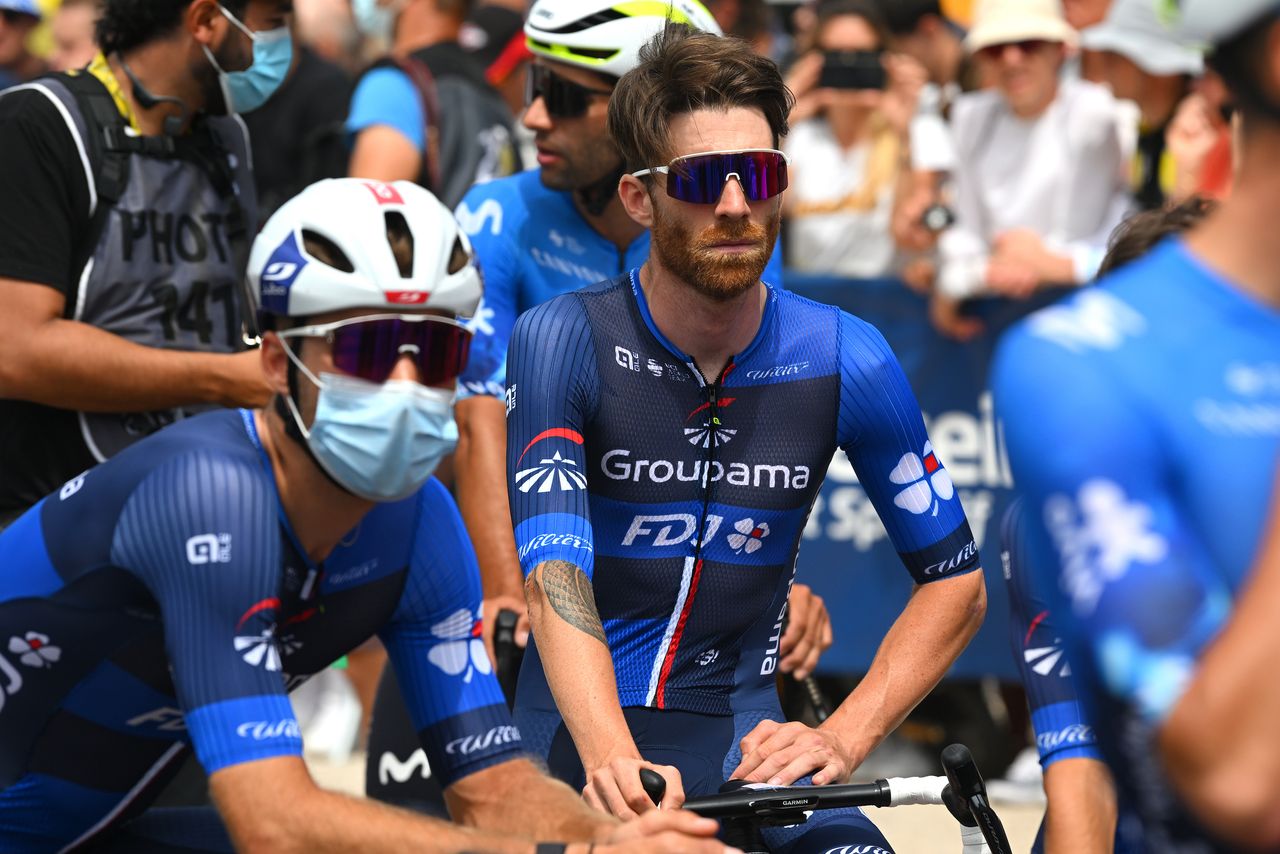 A Groupama-FDJ rider in a face mask at the 2024 Tour de France