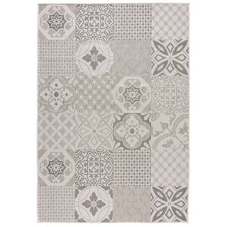 Cut out of grey and white geometric rug