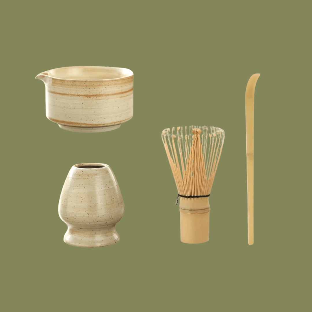 Kitsch and Cozy Premium Ceramic Matcha Set in light brown against green background.