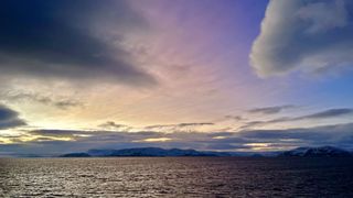 purple and yellow sky during one morning aboard the Hurtigruten Coastal Express