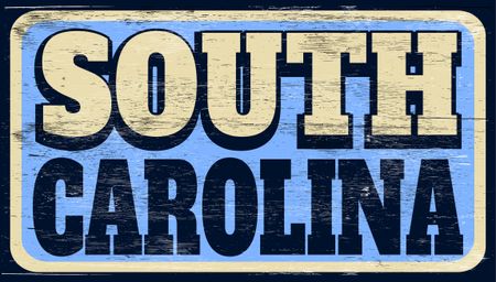 Aged retro South Carolina sign on wood