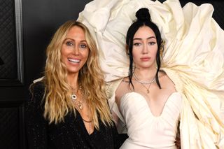 LOS ANGELES, CALIFORNIA - MARCH 14: (L-R) Tish Cyrus and Noah Cyrus attend the 63rd Annual GRAMMY Awards at Los Angeles Convention Center on March 14, 2021.