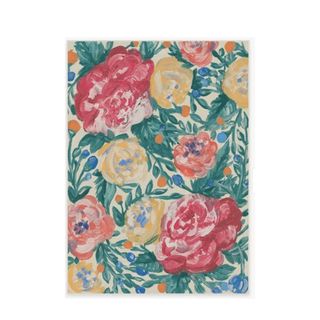 A rectangular rug with dark green leaves and red, orange, and yellow roses artistic illustrations