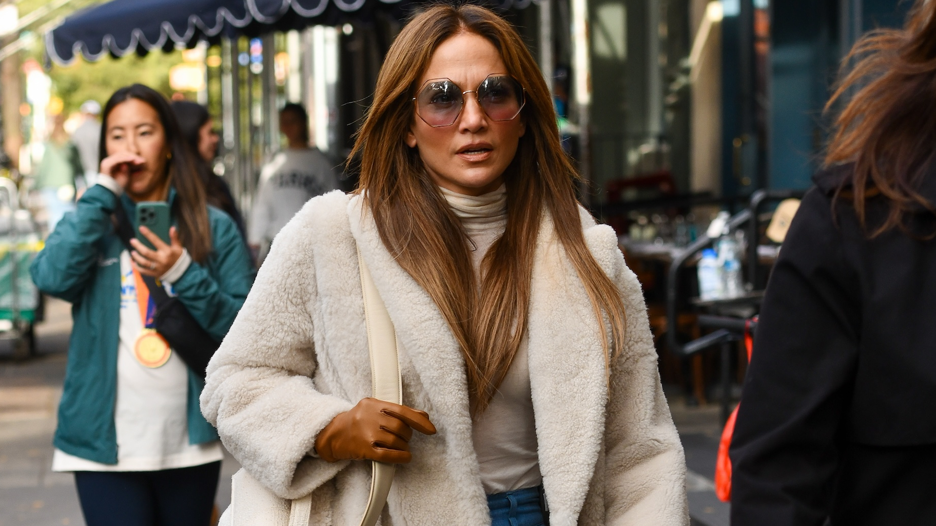 Jennifer Lopez swapped her black leggings for a brown pair, a matching sweatshirt, and white sneakers