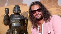 Jason Momoa peeking out from the side of the screen in front of a Helldivers trooper