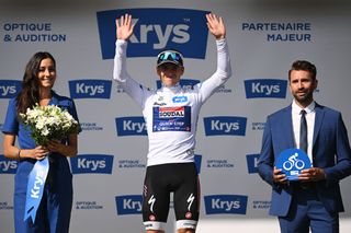 PLATEAU DE BEILLE FRANCE JULY 14 Remco Evenepoel of Belgium and Team Soudal QuickStep White Best Young Rider Jersey celebrates at podium during the 111th Tour de France 2024 Stage 15 a 1977km stage from Loudenvielle to Plateau de Beille 1782m UCIWT on July 14 2024 in Plateau de Beille France Photo by Dario BelingheriGetty Images