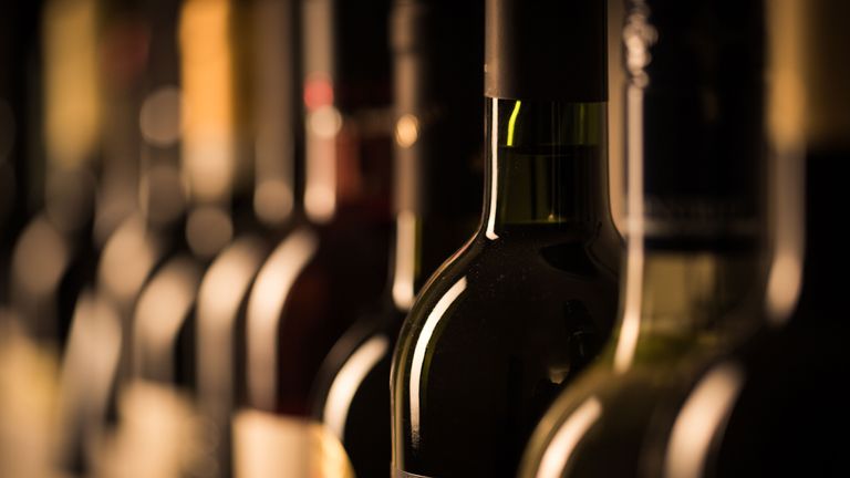 wine fridges: wine bottles in a row