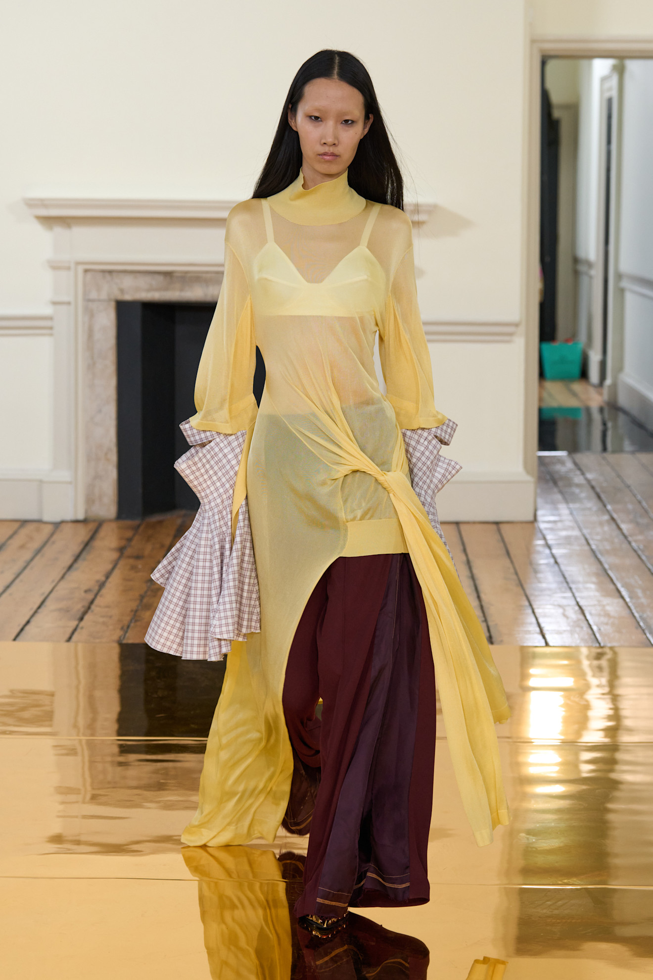 A sheer look from Toga Spring/Summer 2025.
