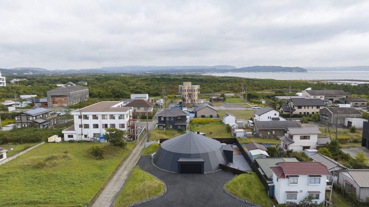 circus tent structure inspires round shaped house in japan, seen here from above