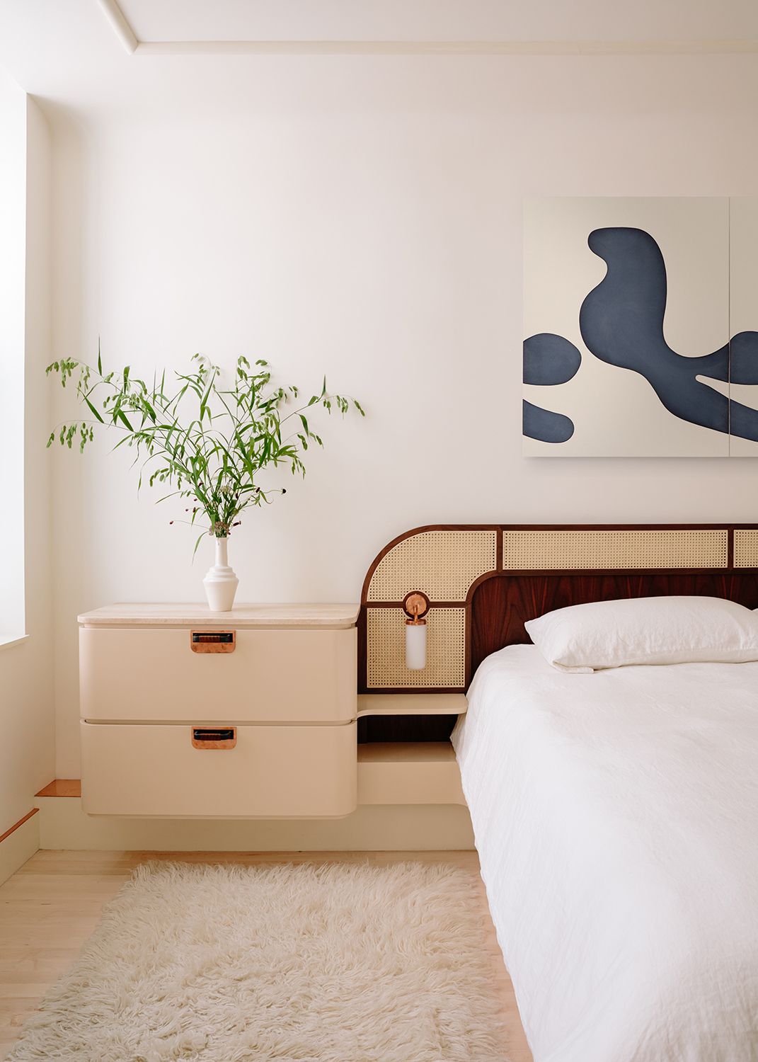 bedroom ideas with statement rattan headboard and beige walls