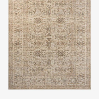 A blue and white area rug from McGee & Co.