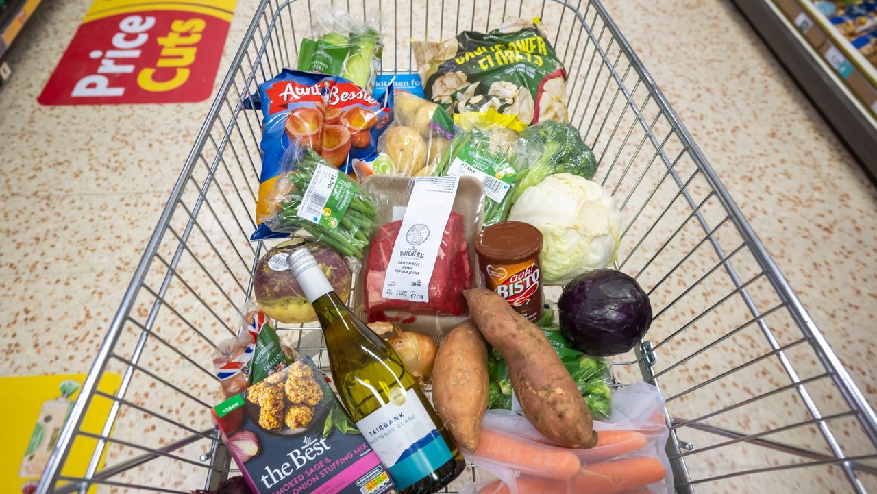 A supermarket trolley full of shopping