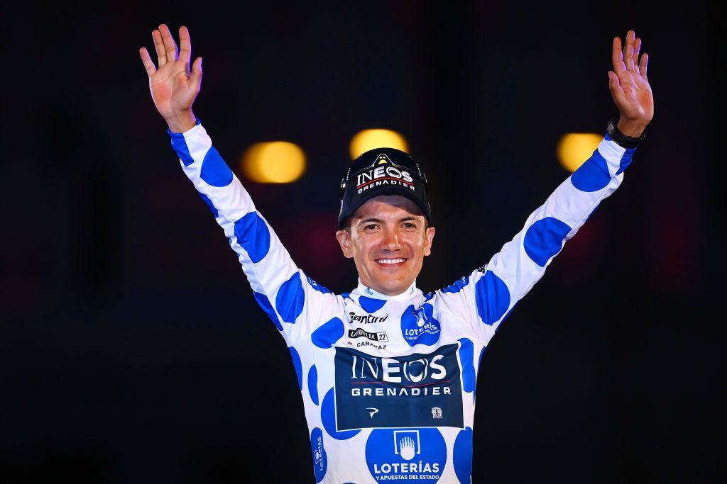 MADRID SPAIN SEPTEMBER 11 Richard Carapaz of Ecuador and Team INEOS Grenadiers celebrates winning the Polka dot mountain jersey on the podium ceremony after the 77th Tour of Spain 2022 Stage 21 a 967km stage from Las Rozas to Madrid LaVuelta22 WorldTour on September 11 2022 in Madrid Spain Photo by Tim de WaeleGetty Images