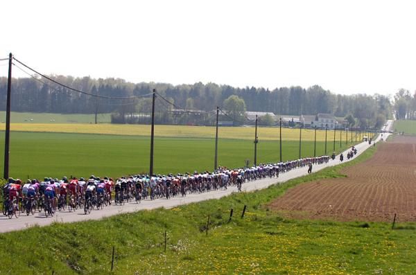 The Fl&egrave;che Wallonne peloton stretched out in the Belgian countryside.