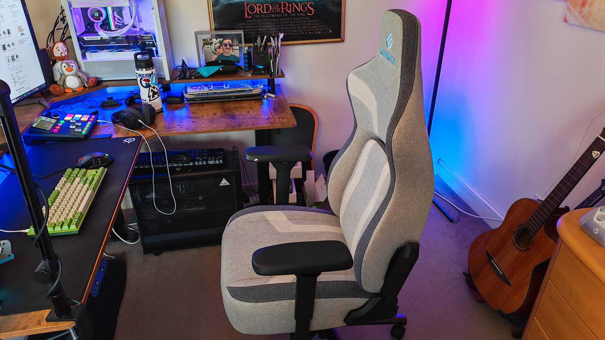 The Eureka Ergonomic Python II next to a gaming desk