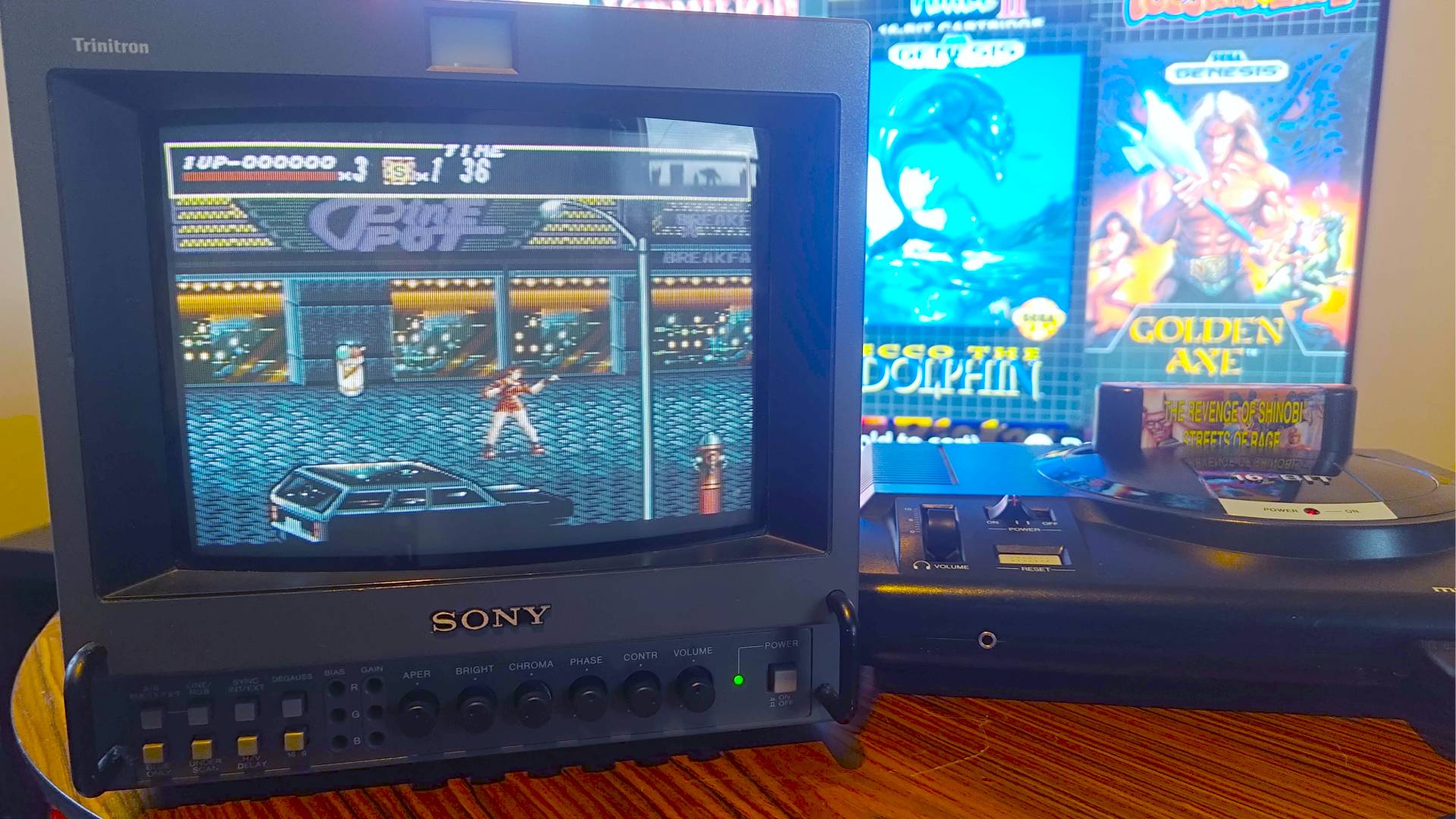 Sega Mega Drive connected to Sony PVM CRT TV with Streets of Rage gameplay on screen.