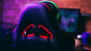 best gaming chairs - A gaming chair next to a desk