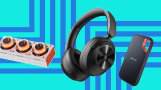 A Genki Moonbase charging station, OneOdio FOcus A6 headphones and a Sandisk Extreme SSD on a blue background