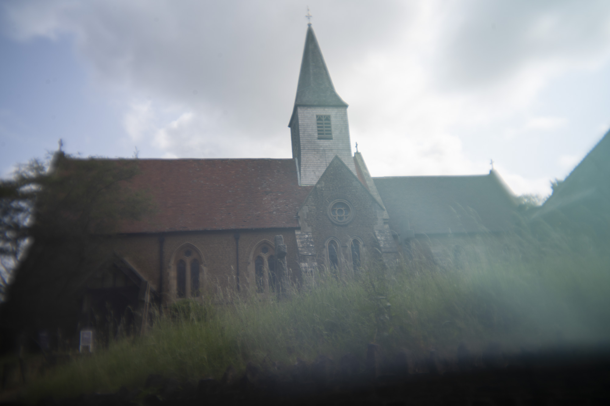 The exterior of an old Anglican church in the UK