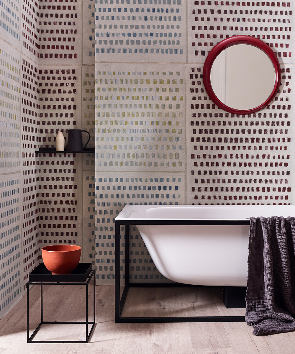 An example of bathroom pictures showing a red, white and black bathroom with patterned wallpaper