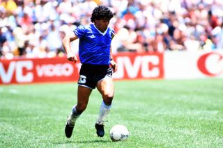 Diego Maradona on the ball for Argentina against England at the 1986 World Cup.