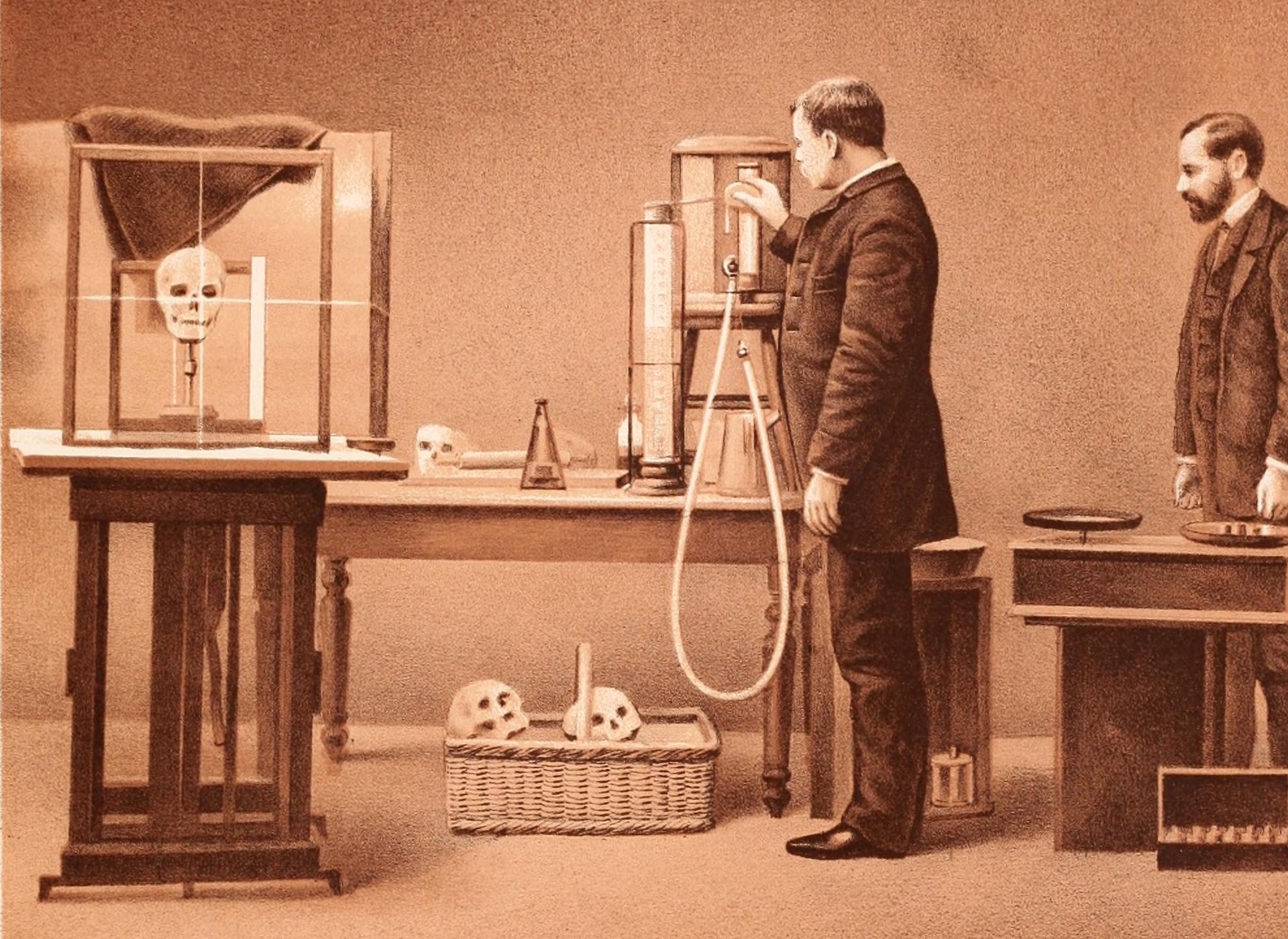 An old illustration of two men measuring the volume of skulls using a device that fills them with water