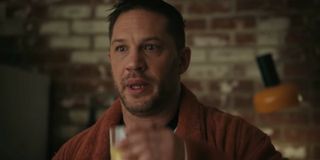 Tom Hardy looking anxious at breakfast in Venom Let There Be Carnage.